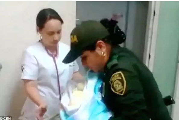 A policewoman held a starving baby that was abandoned in the forest, breastfed her and saved her life