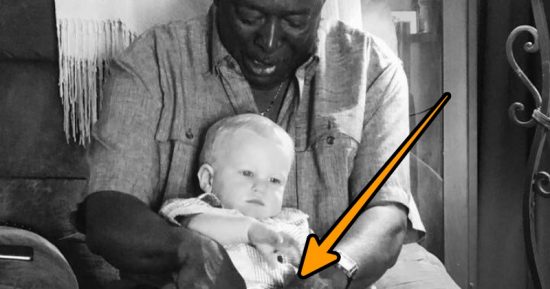 Black Man Holds White Baby, Close Look Tells State Of ‘Race Relations’