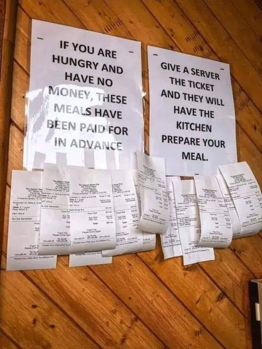 Two people arrive and approached the counter of a little coffee shop